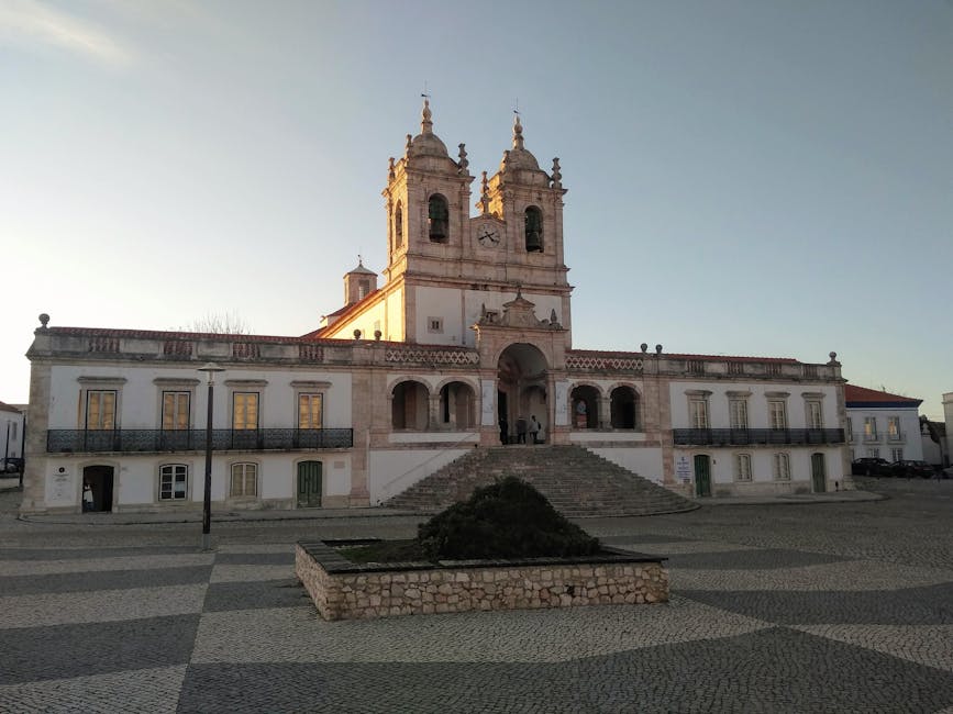 Stunning view of the historic Nossa Senhora da Nazaré Sanctuary at sunset, Portugal